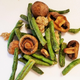 Close-up of French's Green Bean Casserole Snack Mix poured from bag onto white surface